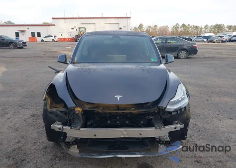 2023 Tesla Model Y Awd/Long Range Dual Motor All-Wheel Drive z USA, uszkodzony, nr VIN 7SAYGDEE5PA125274
